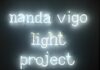 Text with illuminated letters bearing the words Nanda Vigo Light Project, title of the exhibition by Nanda Vigo held in 2019 in Milan, Palazzo Reale