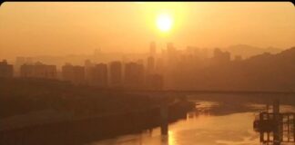 Chongqing China, a view of the industrial district of the chinese city, sunset