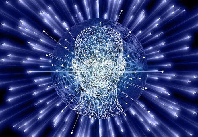 Digital Transformation nella foto i cui colori sono nero, bianco e blu, si vede una sagoma di testa umana con reticolato simile a un robot