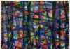 L'immagine mostra un'opera dell'artista Aurelio Sartorio chiamata "Gratitudo". L'opera sii compone di numerose linee di diverso colore intrecciate l'una sopra l'altra senza un pattern preciso. tutte le linee sono leggermente trasparenti lasciando vedere quelle sottostanti in un gioco di velature