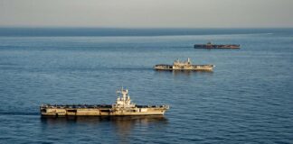 The U.S. Navy aircraft carrier USS Harry S. Truman (CVN-75), top, the Italian aircraft carrier Cavour (550) and the French aircraft carrier Charles de Gaulle (R 91) underway in the Mediterranean Sea in formation on 6 February 2022.