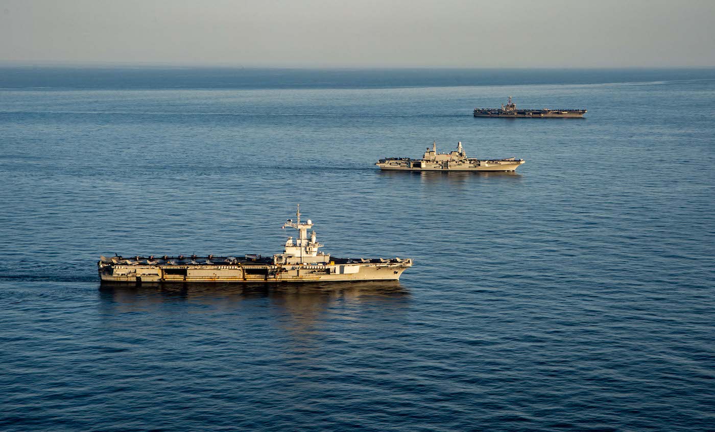 The U.S. Navy aircraft carrier USS Harry S. Truman (CVN-75), top, the Italian aircraft carrier Cavour (550) and the French aircraft carrier Charles de Gaulle (R 91) underway in the Mediterranean Sea in formation on 6 February 2022.